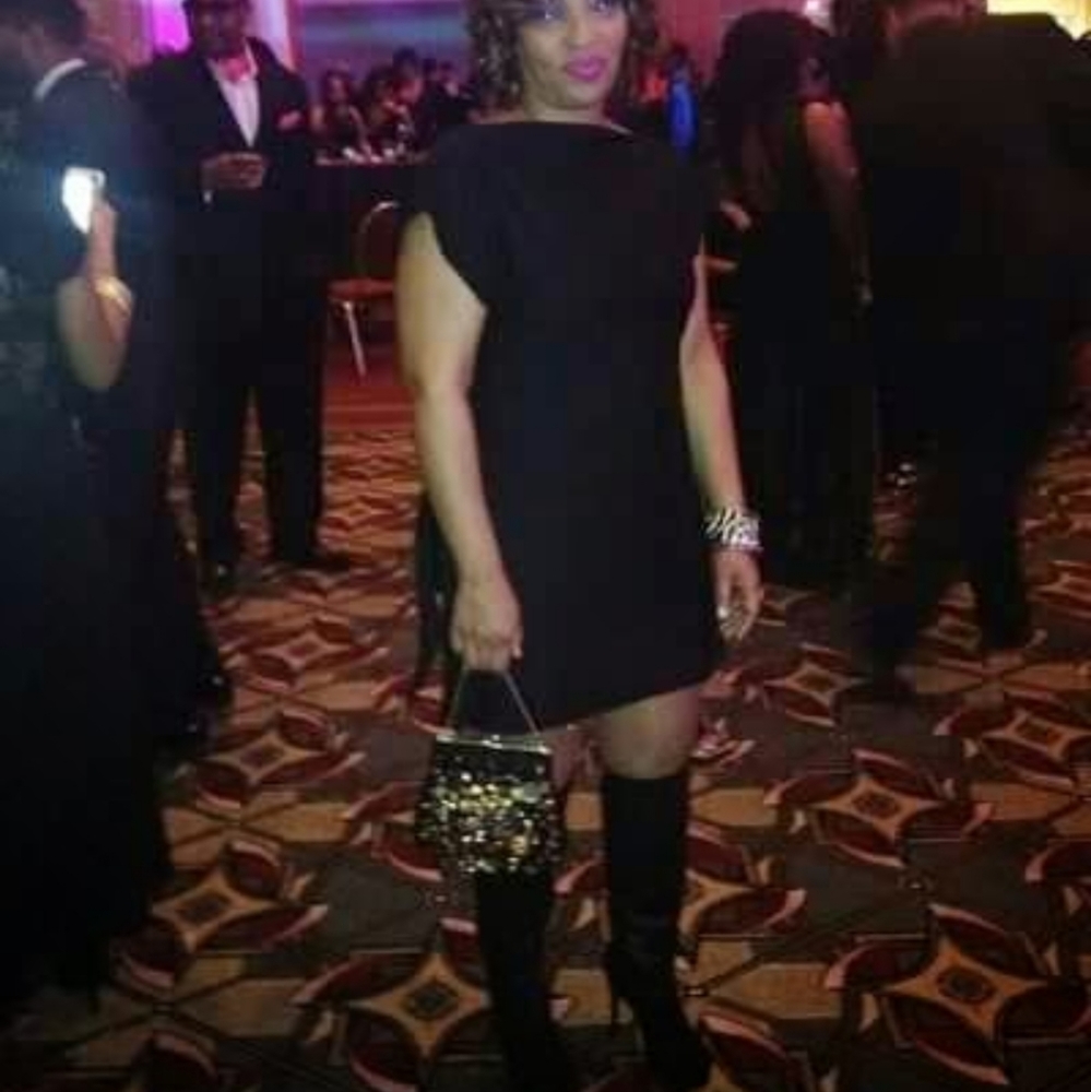 Mayar faux leather/suede black platform and belted boot.